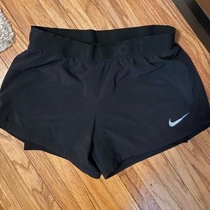 Black athletic shorts in good condition.